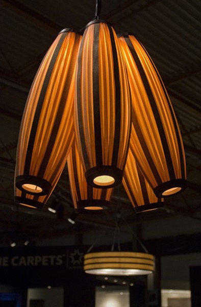 Pendal lighting in wood veneer in bistro above bar and tables in BIS expo_-_2